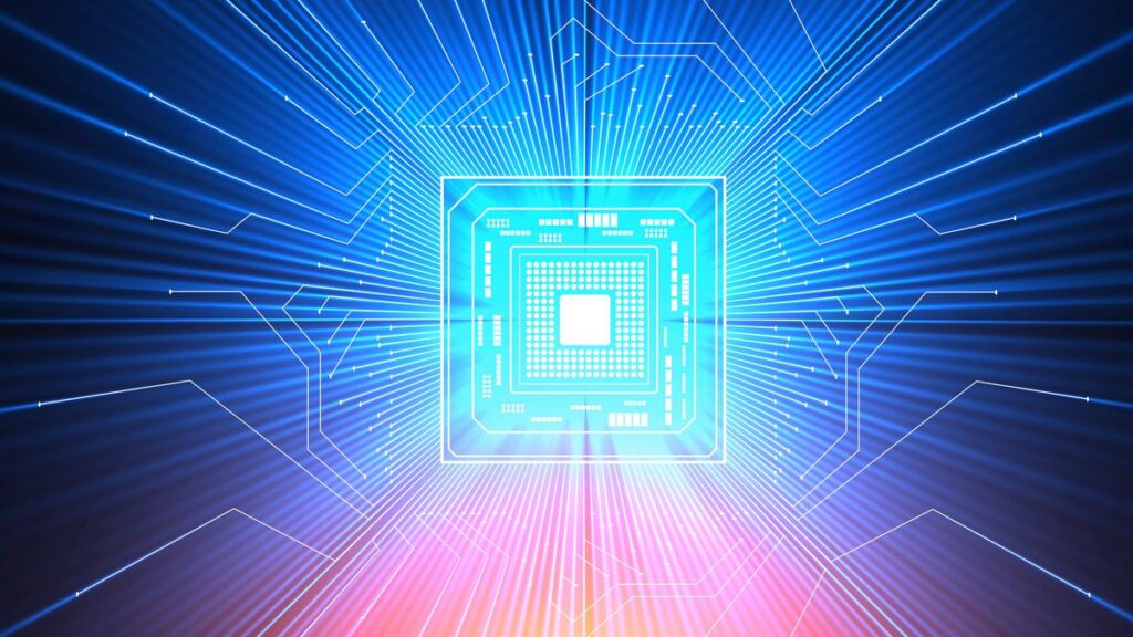 An illustration of a quantum computer, shown as a blue computer chip emanating white beams of light in all directions. At the bottom of the frame, pink and orange light can be seen, while to either edge of frame darkness creeps in.